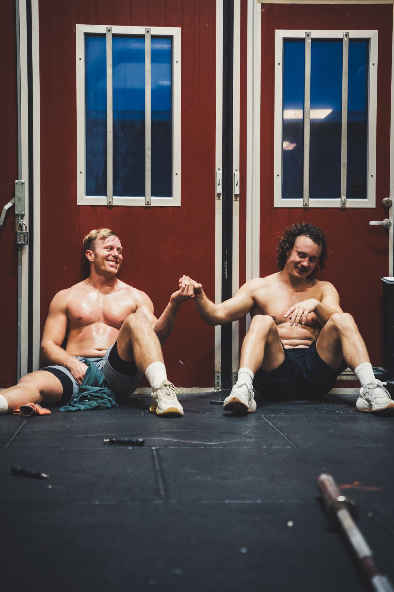 Two athletes recovering together after a hard training session